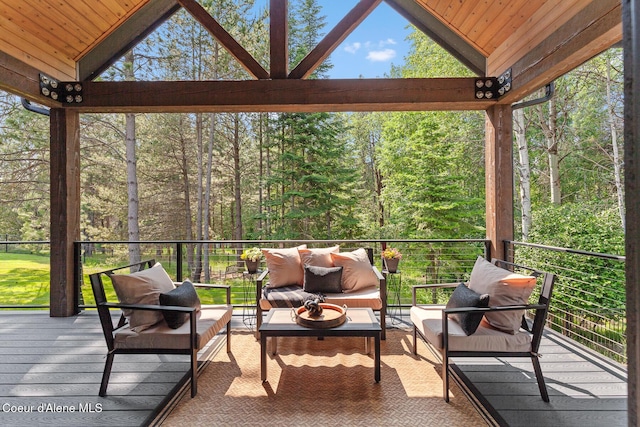 11733 N Blue Jay Loop, Hayden, ID 83835 - sunroom featuring lofted ceiling, an outdoor living space, and plenty of natural light