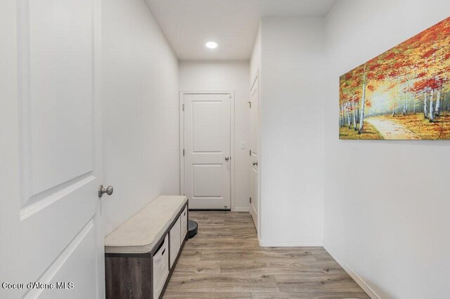 16171 N Hadley Loop, Rathdrum, ID 83858 - hall with light wood-style flooring and recessed lighting
