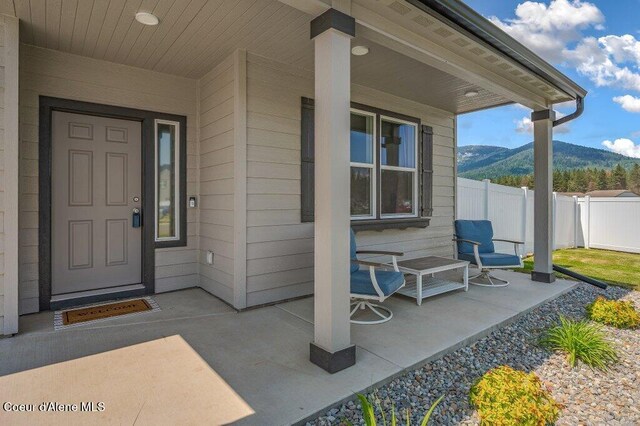 16171 N Hadley Loop, Rathdrum, ID 83858 - property entrance featuring a mountain view and a porch