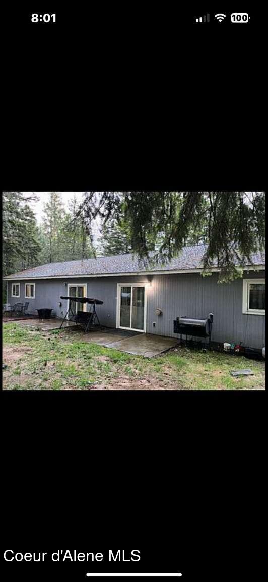 243 Pine St, Moyie Springs, ID 83845 - rear view of house featuring a patio area