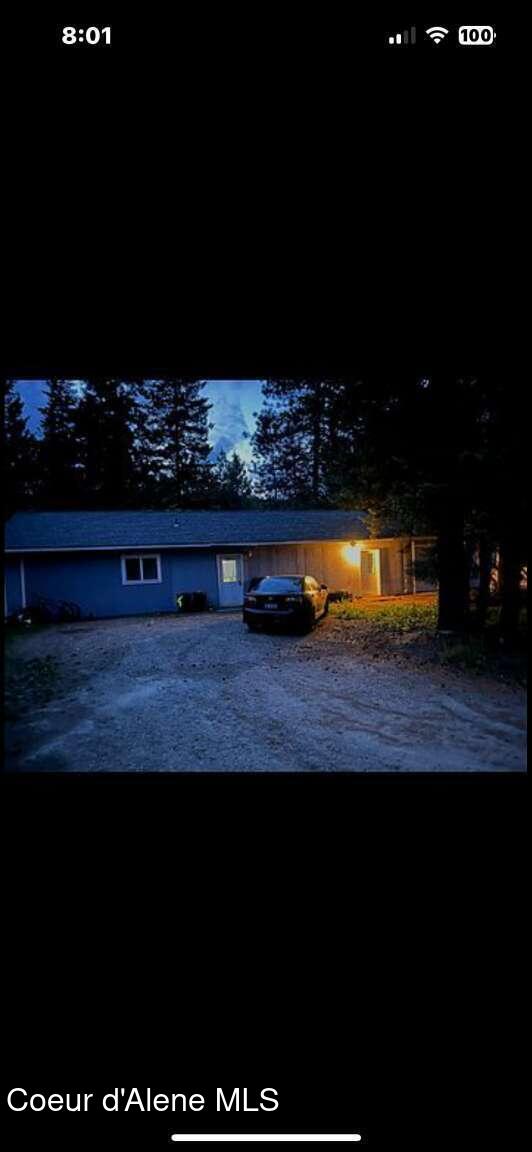243 Pine St, Moyie Springs, ID 83845 - view of front facade featuring driveway