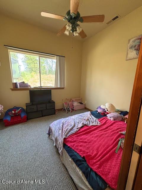 707 Patches Ln, Saint Maries, ID 83861 - bedroom featuring carpet floors and a ceiling fan