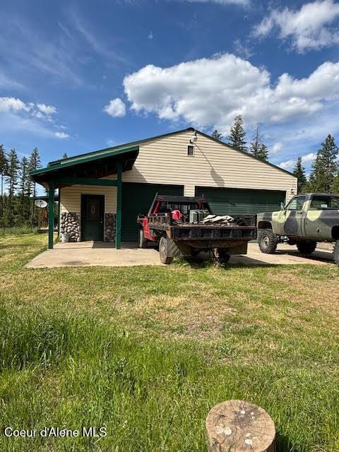 707 Patches Ln, Saint Maries, ID 83861 - view of side of property with a lawn
