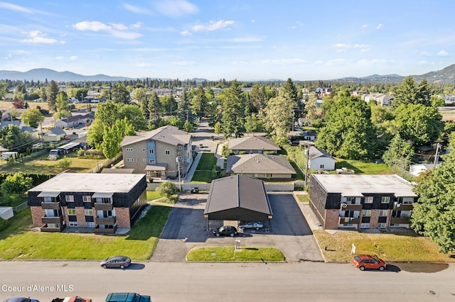 107 E Hattie Ave, Coeur Dalene, ID 83814 - aerial perspective of suburban area featuring a mountainous background