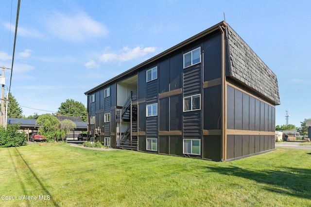 107 E Hattie Ave, Coeur Dalene, ID 83814 - rear view of property with a lawn
