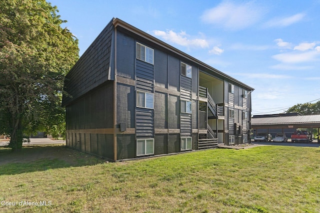 107 E Hattie Ave, Coeur Dalene, ID 83814 - view of property exterior featuring a lawn