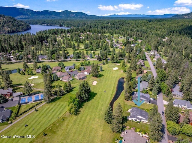 21013 N Circle Rd, Rathdrum, ID 83858 - aerial view of property's location featuring a heavily wooded area, a water and mountain view, and a golf course