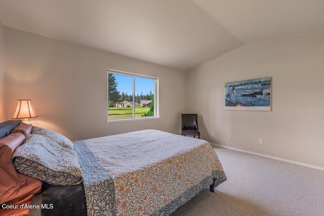 21013 N Circle Rd, Rathdrum, ID 83858 - bedroom with vaulted ceiling, carpet flooring, and baseboards