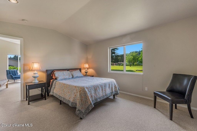 21013 N Circle Rd, Rathdrum, ID 83858 - bedroom featuring lofted ceiling, light colored carpet, and baseboards