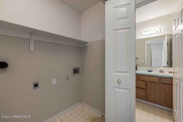21013 N Circle Rd, Rathdrum, ID 83858 - laundry room featuring light floors, hookup for an electric dryer, hookup for a washing machine, and baseboards