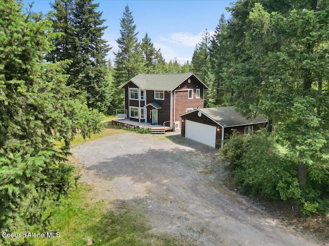 596 Overlake View Rd, Cocolalla, ID 83813 - view of front of house with a garage and driveway