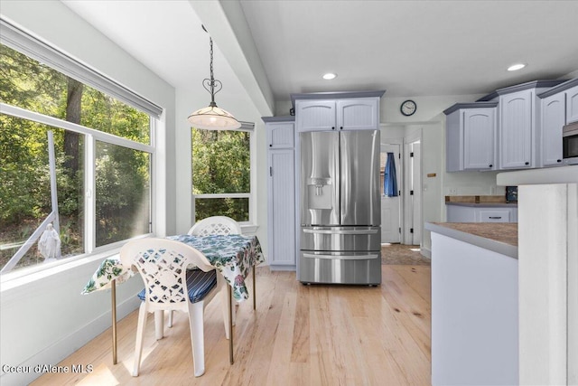 596 Overlake View Rd, Cocolalla, ID 83813 - kitchen with stainless steel appliances, light wood finished floors, hanging light fixtures, and recessed lighting