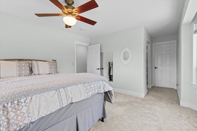 596 Overlake View Rd, Cocolalla, ID 83813 - bedroom with light carpet and a ceiling fan