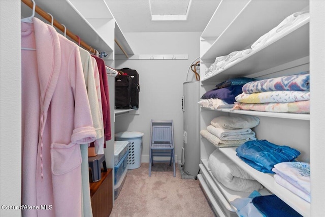 596 Overlake View Rd, Cocolalla, ID 83813 - walk in closet featuring water heater and carpet floors