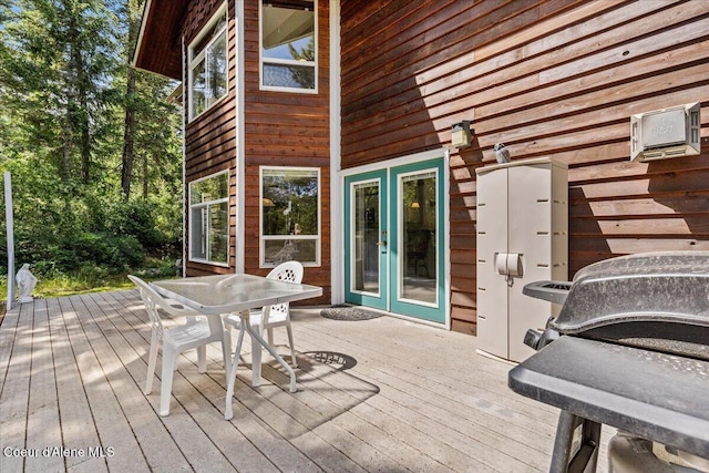 596 Overlake View Rd, Cocolalla, ID 83813 - deck with area for grilling and outdoor dining area