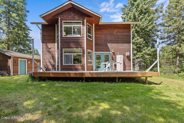 596 Overlake View Rd, Cocolalla, ID 83813 - back of house with a deck and a yard