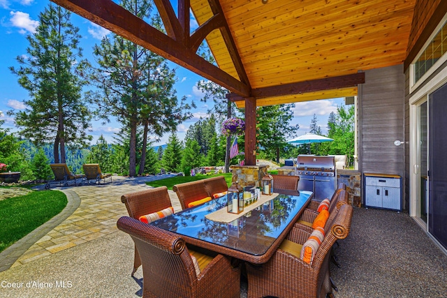 3857 E Beckon Ridge Rd, Coeur Dalene, ID 83814 - view of patio / terrace featuring outdoor dining area and area for grilling