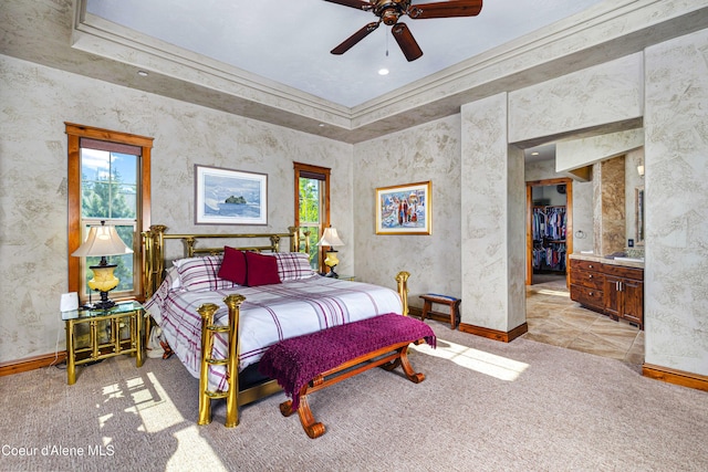 3857 E Beckon Ridge Rd, Coeur Dalene, ID 83814 - bedroom featuring multiple windows, light carpet, a walk in closet, and ceiling fan