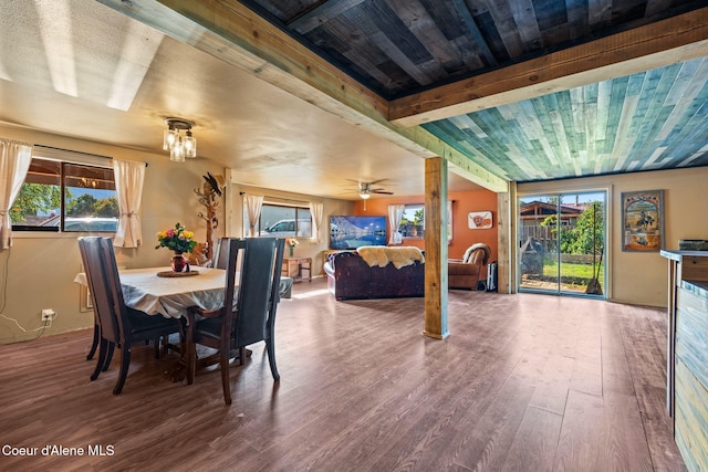 312 E 5th Ave, Clark Fork, ID 83811 - dining area with wood finished floors, plenty of natural light, ceiling fan, and beam ceiling