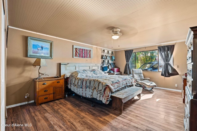 312 E 5th Ave, Clark Fork, ID 83811 - bedroom featuring wood finished floors and crown molding