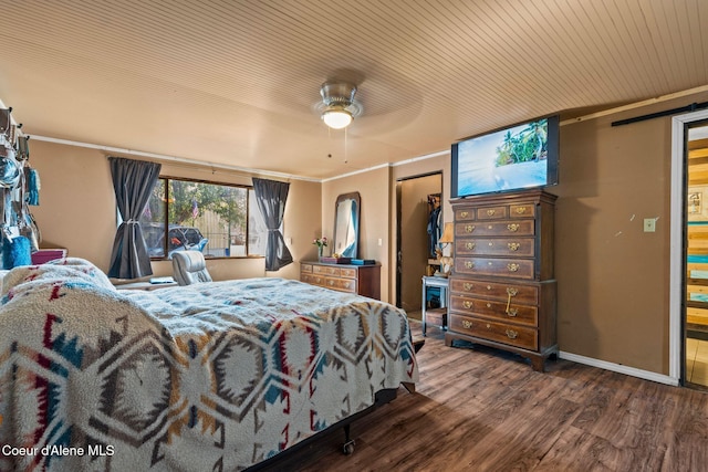 312 E 5th Ave, Clark Fork, ID 83811 - bedroom featuring wood finished floors, ornamental molding, and a closet