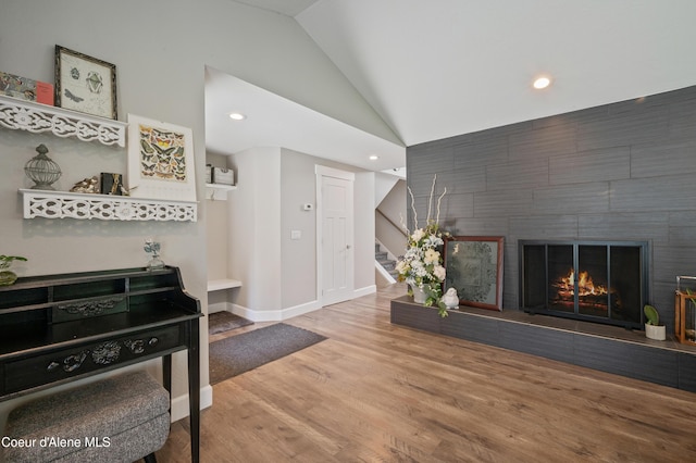 3593 W Fairway Dr, Coeur Dalene, ID 83815 - living room featuring vaulted ceiling, wood finished floors, stairs, recessed lighting, and baseboards