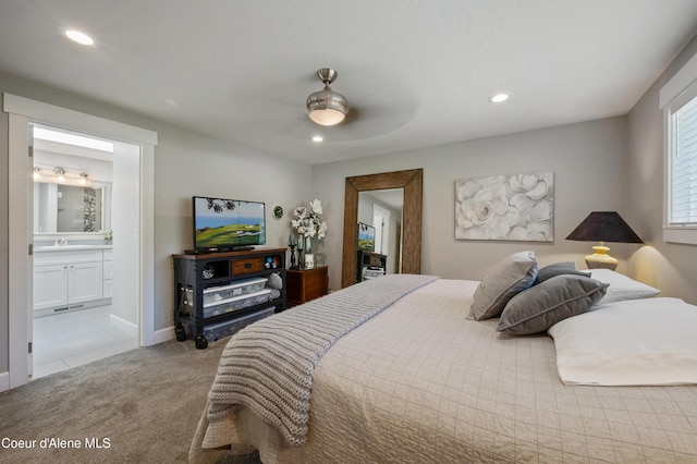 3593 W Fairway Dr, Coeur Dalene, ID 83815 - carpeted bedroom featuring recessed lighting, ensuite bathroom, a sink, and ceiling fan
