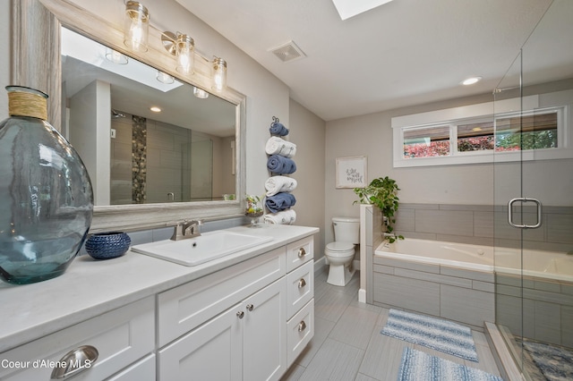 3593 W Fairway Dr, Coeur Dalene, ID 83815 - full bathroom featuring vanity, toilet, a garden tub, tiled shower, and tile patterned floors