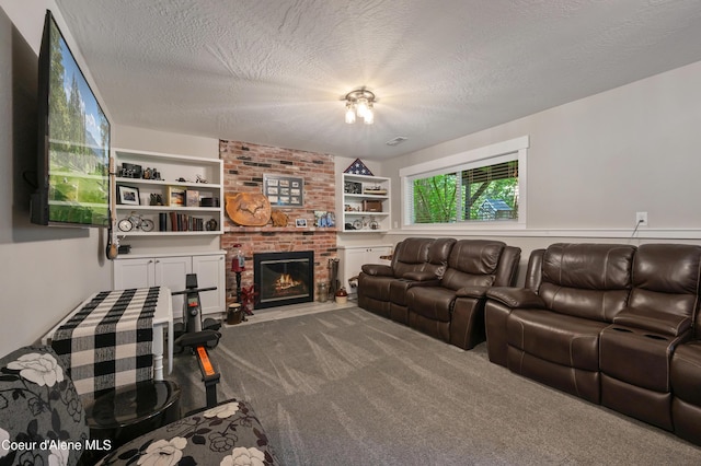 3593 W Fairway Dr, Coeur Dalene, ID 83815 - living room featuring carpet flooring, a brick fireplace, a textured ceiling, and built in features