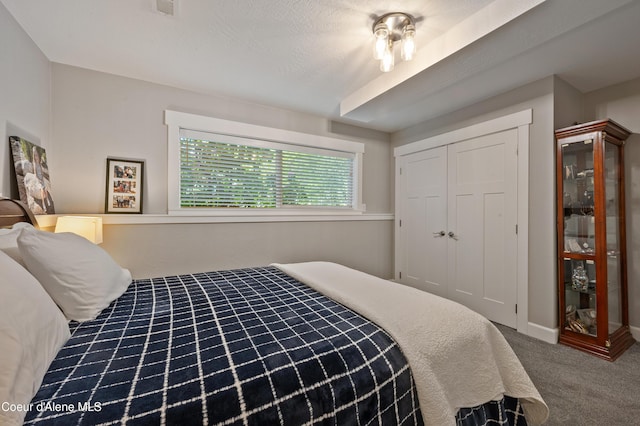 3593 W Fairway Dr, Coeur Dalene, ID 83815 - carpeted bedroom featuring a closet and baseboards
