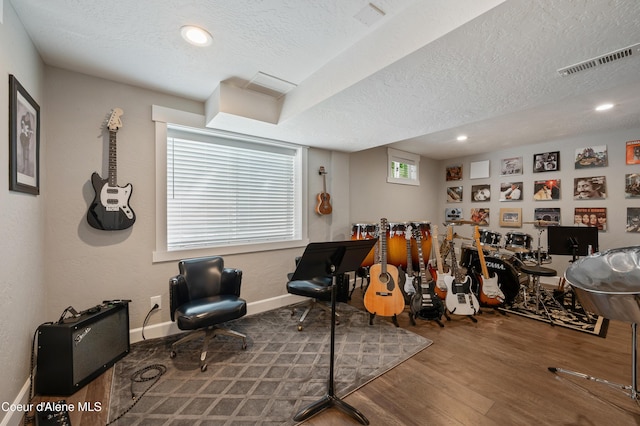 3593 W Fairway Dr, Coeur Dalene, ID 83815 - sitting room with a textured ceiling, wood finished floors, baseboards, and recessed lighting