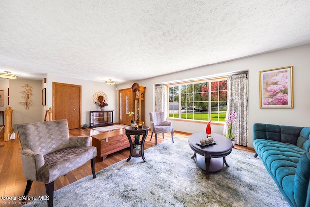 8416 N Haye Ln, Newman Lake, WA 99025 - living room with a textured ceiling and wood finished floors