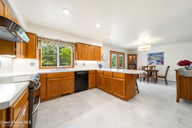 8416 N Haye Ln, Newman Lake, WA 99025 - kitchen with black dishwasher, wall chimney range hood, stainless steel range with electric stovetop, a peninsula, and healthy amount of natural light