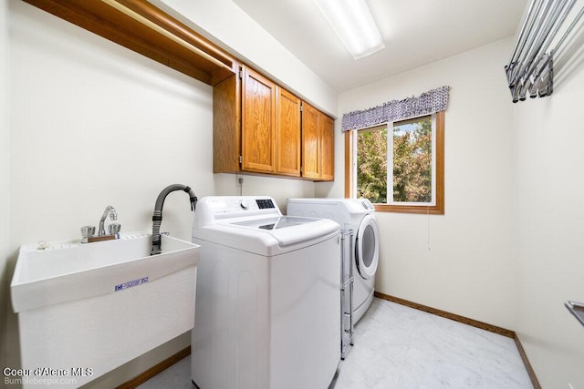 8416 N Haye Ln, Newman Lake, WA 99025 - laundry area with cabinet space, washing machine and clothes dryer, and baseboards