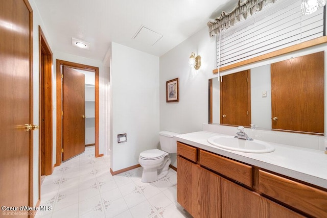 8416 N Haye Ln, Newman Lake, WA 99025 - bathroom with tile patterned floors, vanity, and toilet