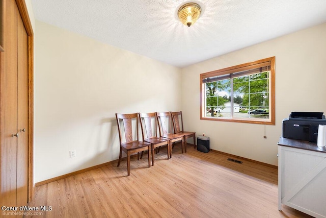 8416 N Haye Ln, Newman Lake, WA 99025 - living area with light wood-type flooring and baseboards