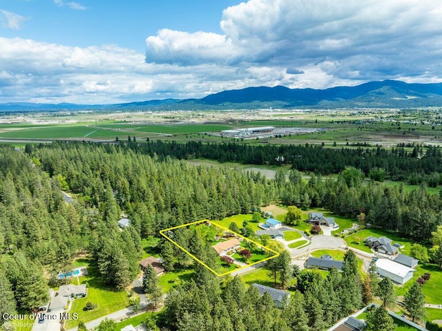 8416 N Haye Ln, Newman Lake, WA 99025 - aerial view of property's location featuring property parcel outlined and a mountain backdrop