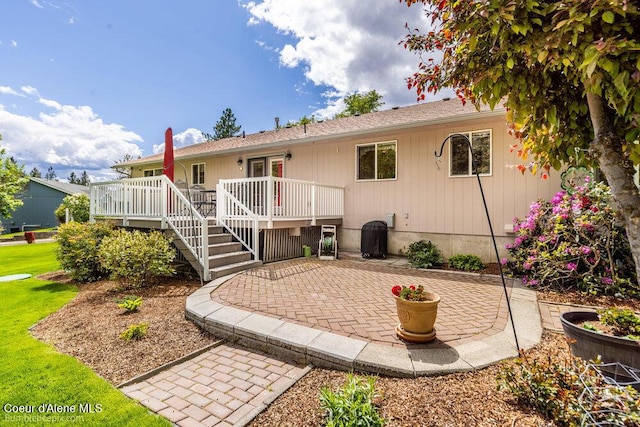 8416 N Haye Ln, Newman Lake, WA 99025 - rear view of house with a patio area and a deck