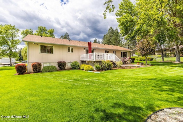 8416 N Haye Ln, Newman Lake, WA 99025 - back of property with a deck and a lawn