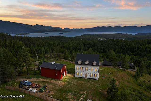 556 Vortex Way, Sagle, ID 83860 - aerial view of property and surrounding area featuring a mountainous background and a forest