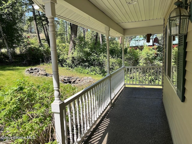 11019 W Crystal Bay Rd, Post Falls, ID 83854 - porch with view of scattered trees