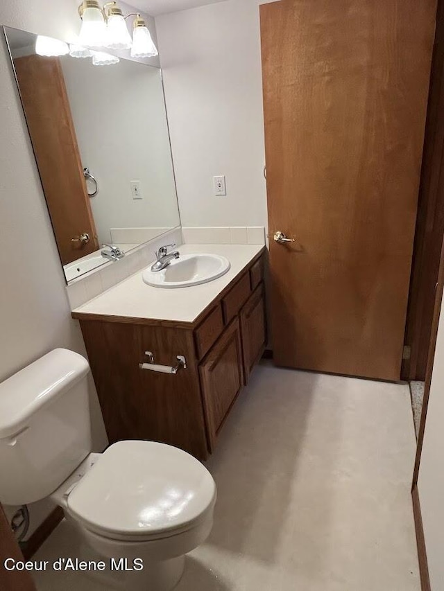 11019 W Crystal Bay Rd, Post Falls, ID 83854 - bathroom with toilet and vanity