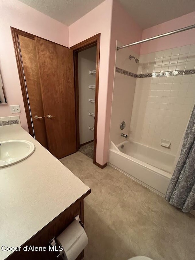 11019 W Crystal Bay Rd, Post Falls, ID 83854 - bathroom with shower / tub combo with curtain and vanity
