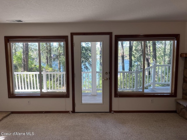 11019 W Crystal Bay Rd, Post Falls, ID 83854 - entryway featuring carpet flooring and baseboards