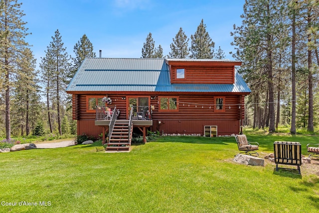 2609 W Seasons Rd, Athol, ID 83801 - rear view of house featuring log siding, stairway, a deck, and a yard