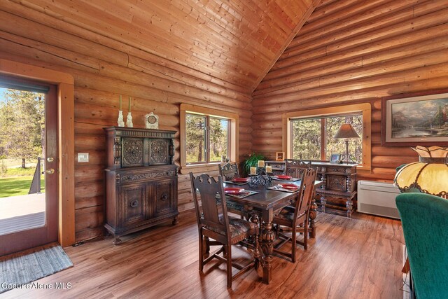 2609 W Seasons Rd, Athol, ID 83801 - dining space featuring plenty of natural light, wooden ceiling, wood finished floors, high vaulted ceiling, and rustic walls