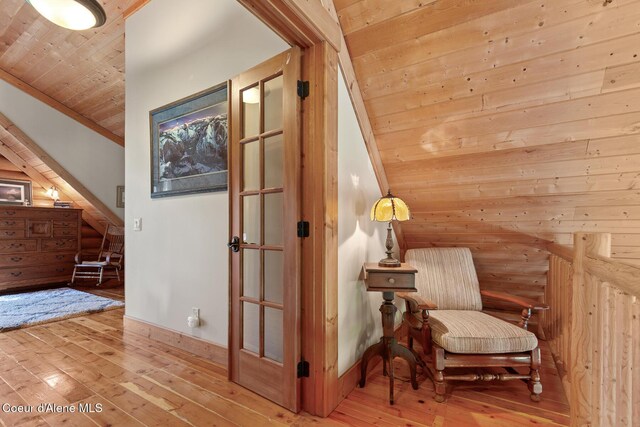 2609 W Seasons Rd, Athol, ID 83801 - living area with wood-type flooring, wooden ceiling, lofted ceiling, and baseboards