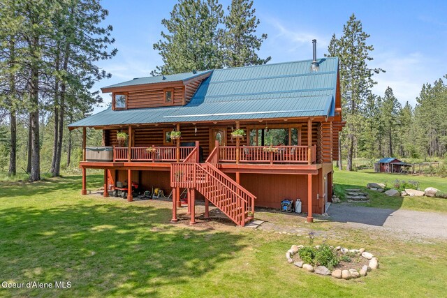 2609 W Seasons Rd, Athol, ID 83801 - back of house featuring log siding, a yard, stairs, metal roof, and a deck