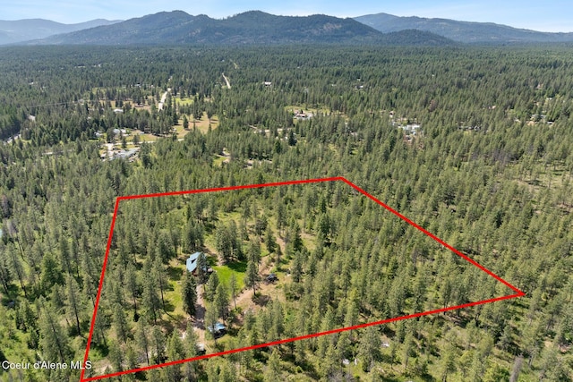 2609 W Seasons Rd, Athol, ID 83801 - view of property location featuring a forest, a mountain backdrop, and property boundaries highlighted
