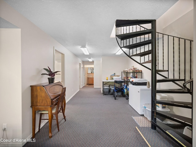26370 S Hinds Dr, Saint Maries, ID 83861 - hallway with carpet floors, stairs, baseboards, and a textured ceiling